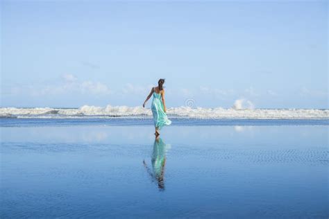 Young Woman Walking Barefoot on the Beach. Full Body Portrait. Slim ...