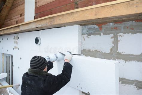 Builder Installing Rigid Styrofoam Insulation Board for Energy Saving. Editorial Photography ...