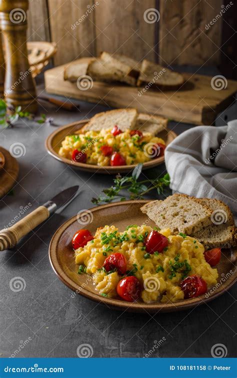 Scrambled eggs with herbs stock photo. Image of background - 108181158