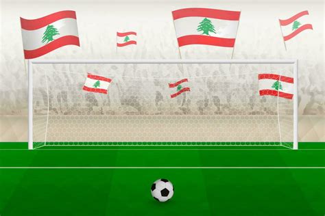 Lebanon football team fans with flags of Lebanon cheering on stadium, penalty kick concept in a ...