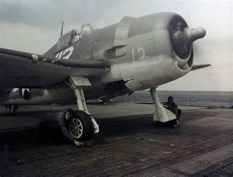 Grumman F6F-3 Hellcat fighter in preparation for take off, 1943.