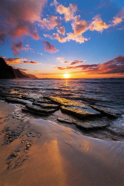 Sunset Over The Na Pali Coast From Ke'e Photograph by Russ Bishop