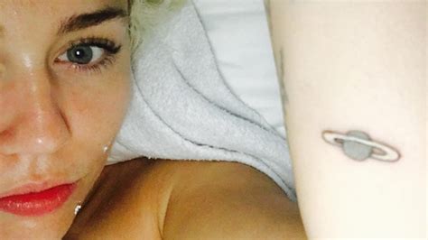 Miley Cyrus' new tattoo is an astronomy lesson for fans — and Miley ...