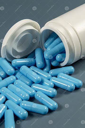 Blue Antibiotic Capsule Pills Texture with White Bottle. Pharmaceutical ...