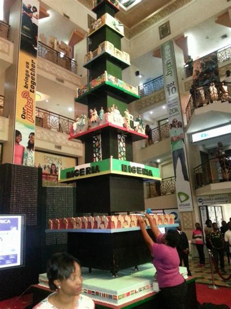 See Tosan Jemide of Cakes by Tosan's "Tallest Cake in Africa" | First ...