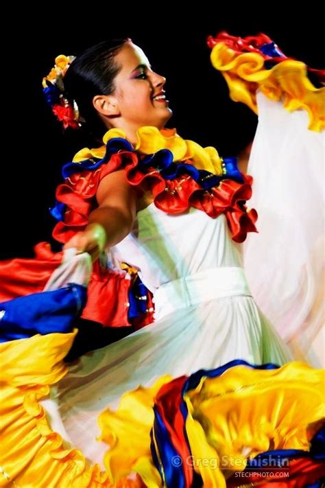 A female dancer from Venezuela performing at a folk dance festival in ...