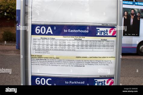 Glasgow First Bus timetable with a blurred bus in the background Stock ...