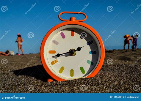 Clock on the Sand Beach stock photo. Image of watch - 111566816