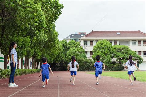 The Teacher Watched The Children Run On The Playground Picture And HD ...