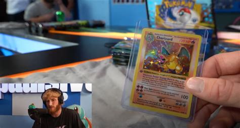 YouTuber Logan Paul opens Pokemon Booster Box with $220,000 Charizard ...