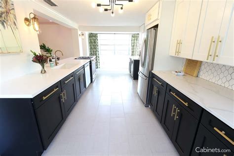 Classic Black & White Galley Kitchen with Gold Hardware | Galley kitchen design, White galley ...