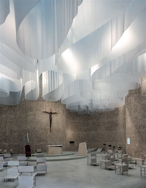 Architects Design Austere White Church With Elegant Flowing Form