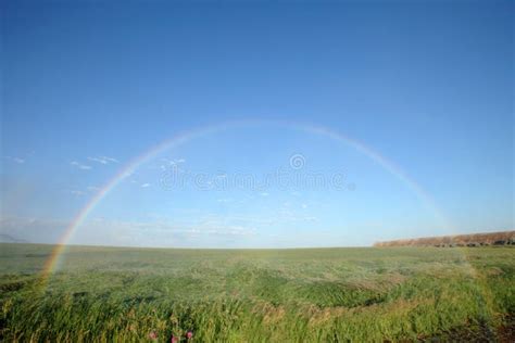 A Full Arch Rainbow Showing Both Ends. Stock Photo - Image of sunny ...