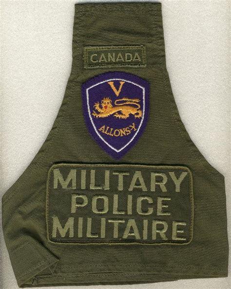 The corrected subdued pattern patch worn on an armlet by 5e Peleton de Police Militaire.