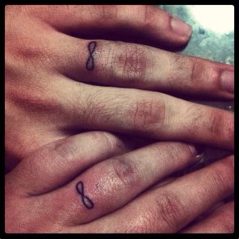 Infinity band tattoo | Infinity couple tattoos, Tattoos, First tattoo