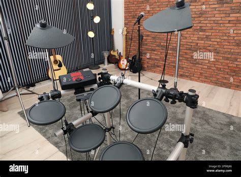 Modern music studio with microphone and different electronic instruments Stock Photo - Alamy