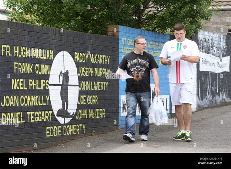 Murals dedicated to the 1971 Ballymurphy Massacre seen on a wall in ...