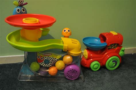 selling some stuff: Playskool Busy Ball Popper and Choo-Choo