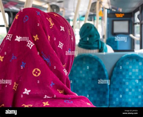 Two ladies wearing Hijabs on a London bus Stock Photo - Alamy