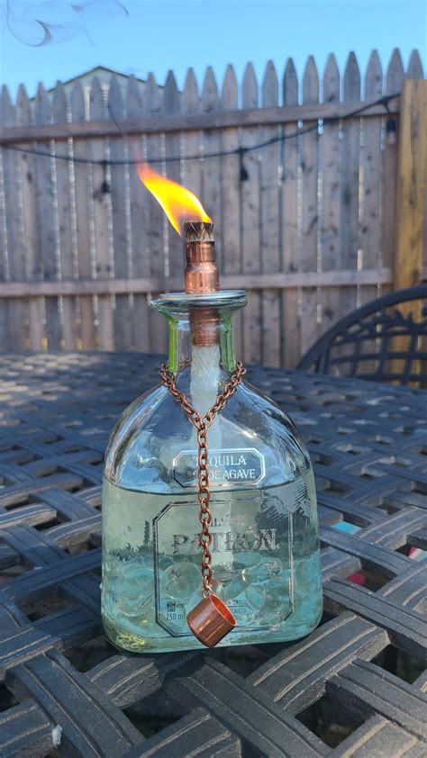 Upcycled Patron Bottle Tiki Torch with copper wick holder and snuffer. Liquor Bottle Lamp ...