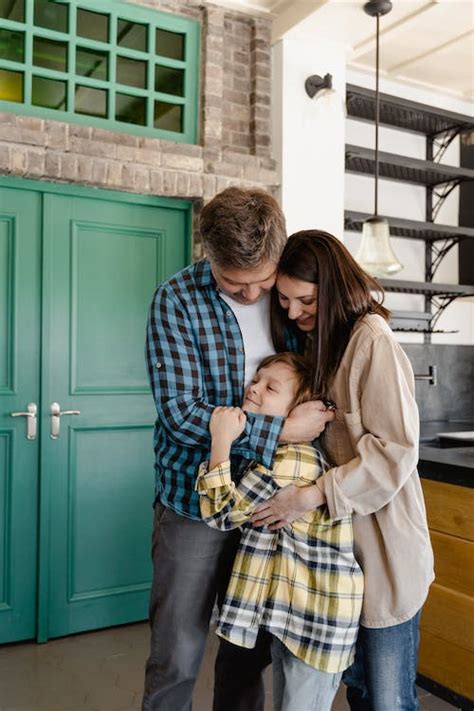 A Family Hugging Each Other · Free Stock Photo