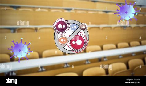 Composition of covid viruses and no entry sign over school classroom Stock Photo - Alamy