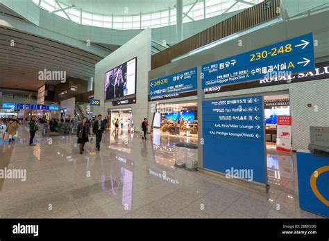 Interior view of Seoul Incheon Airport new Terminal 2, mostly used by Korean Air. Stores and ...