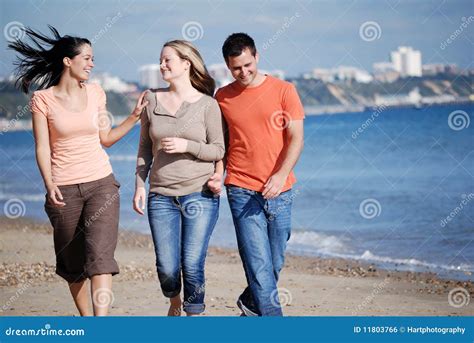 Friends Walking Together At The Beach Stock Photo - Image of happy, sunny: 11803766