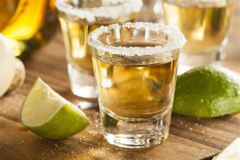 Tequila Shots with Lime and Salt Stock Photo - Image of liquid, drink: 38930356