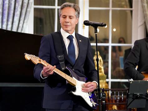 Watch US Secretary of State Antony Blinken play Muddy Waters on his Fender Strat at State ...