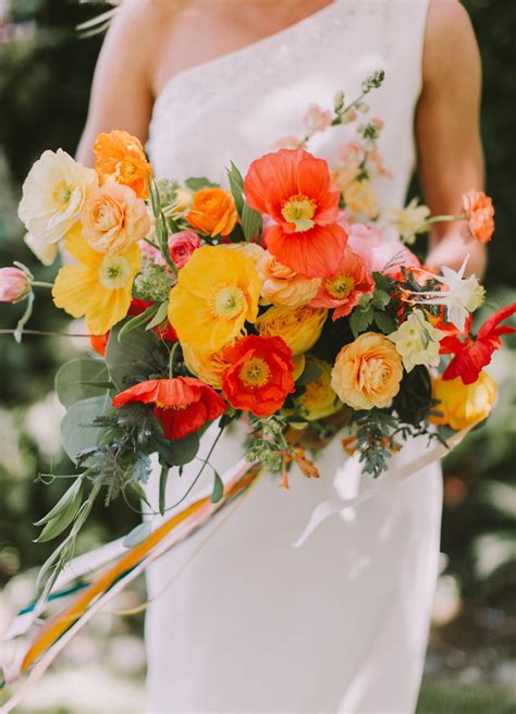 Our Favorite Bouquets from 2017 - poppy yellow and orange #bouquet #weddingbouquet #bouqu ...