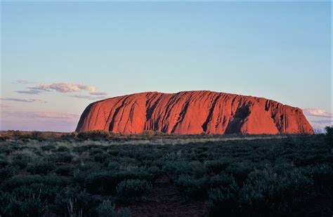 Uluru, or Ayers Rock, is a massive sandstone monolith in the Northern Territory. by lonewolf6738