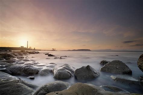 Rocky Beach Sunrise Photograph by Don Jose Romulo Davies - Fine Art America