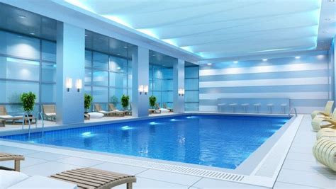 Swimming Pool: Wonderful Light Blue Indoor Pool Design Combined With Wooden Lounge With White ...