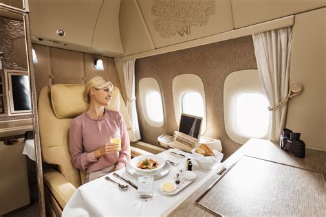 Emirates Boeing 777 First Class private suite dining • JOURJOUR Deals