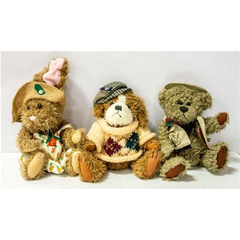 THREE COLLECTIBLE BRASS BUTTON BEARS