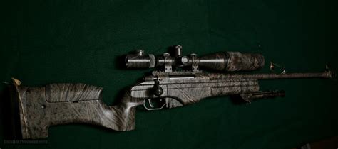 SAKO TRG 42 .338 LUPA w/ NIGHT FORCE SCOPE