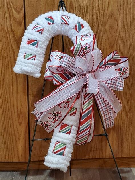 DIYDollar Candy Cane Wreath using Dollar Tree form | Christmas yarn wreaths, Handmade christmas ...