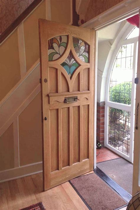 25 Spectacular Wooden Front Door Designs For Your Home Inspiration MOOLTON | Wooden front door ...