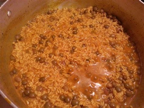 Arroz con gandules: white rice, water or stock, sofrito, can of ...