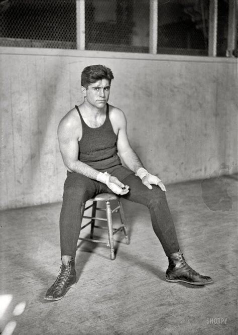 1923, Argentine boxer, Luis Angel Firpo. He's a looker, so he must be fairly new to the sport ...