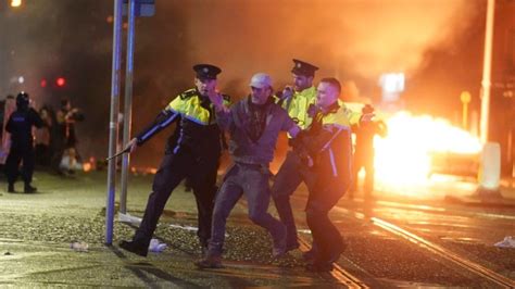 Protesters take to streets in Dublin after knife attack injures three ...