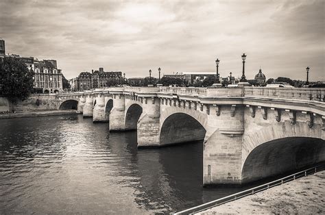 The Oldest Bridge Of Paris Photograph by Sergey Simanovsky