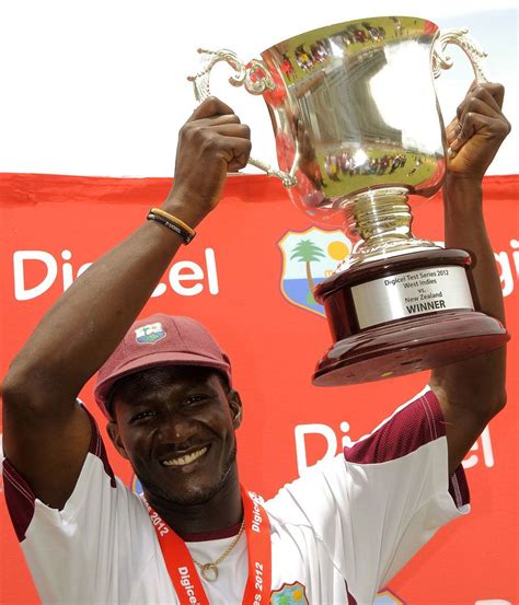 Darren Sammy holds aloft the series trophy | ESPNcricinfo.com