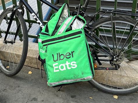 Uber Eats delivery bag editorial stock photo. Image of street - 259603523