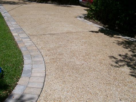 backyard flagstone patio decor ideas | Aggregate driveway, Exposed aggregate driveway, Driveway ...