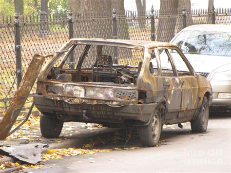 The burned down car Photograph by Yury Bashkin