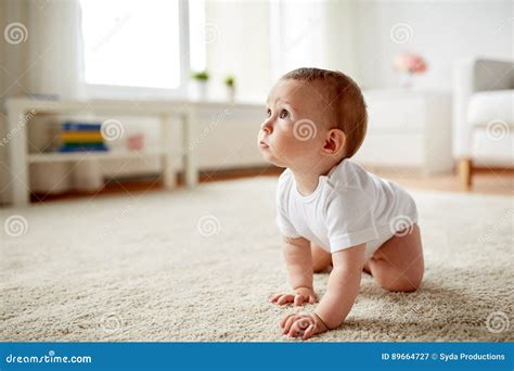 Little Baby in Diaper Crawling on Floor at Home Stock Image - Image of ...