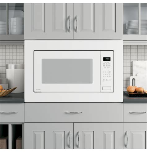 GE Profile™ 2.2 Cu. Ft. White Built In Microwave | Livingood's Appliances & Bedding