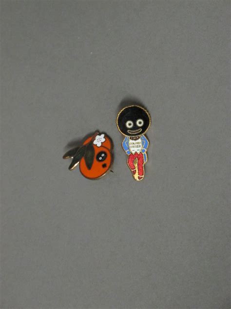 A Golden Thread Golliwog badge together with 1 other | 14th March 2012 | Denhams